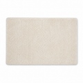 Tapis de bain ivoire en polyester recyclé 50x80 cm